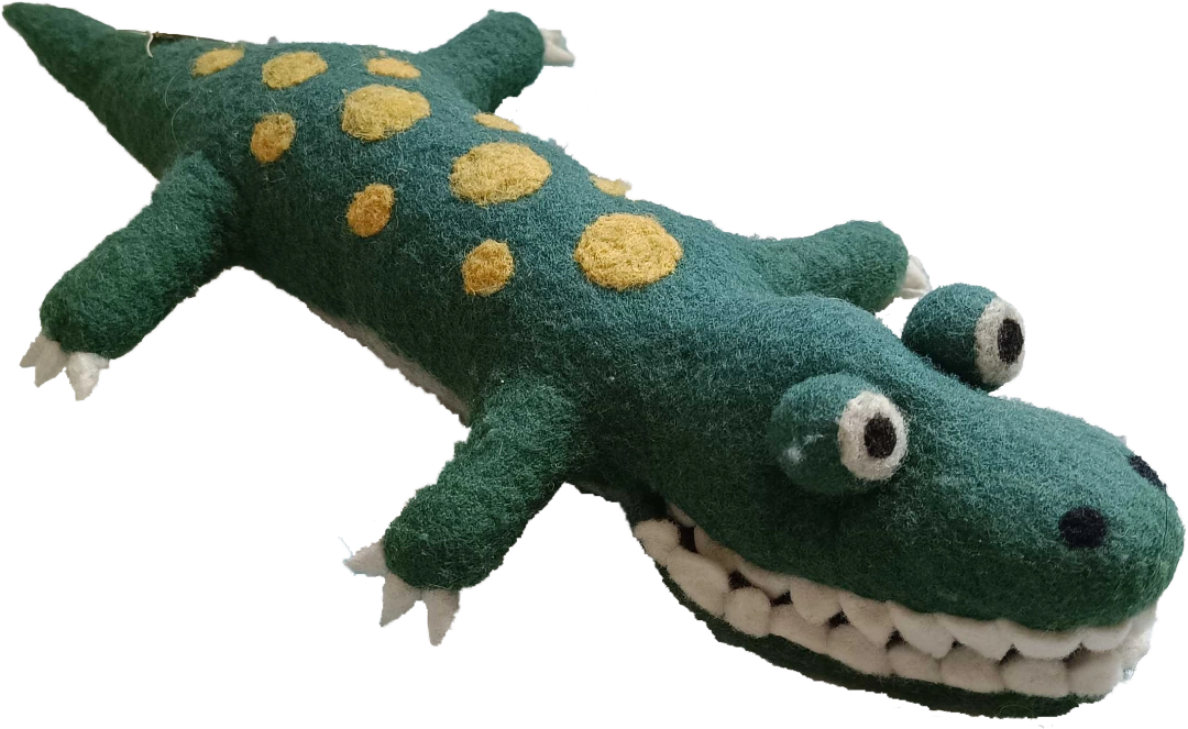A crocodile plush with yellow spots on his back. He has big bulbous eyes.